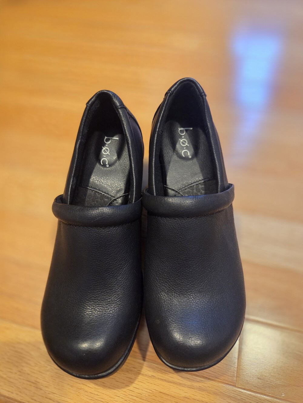 B.O.C. Nadiyya clogs feature a rounded toe and a padded collar for comfort. New.